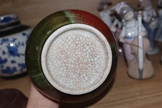 A Chinese squat baluster vase, crackle-glazed in green and red, a blue and white ginger jar and cover and a redware teapot